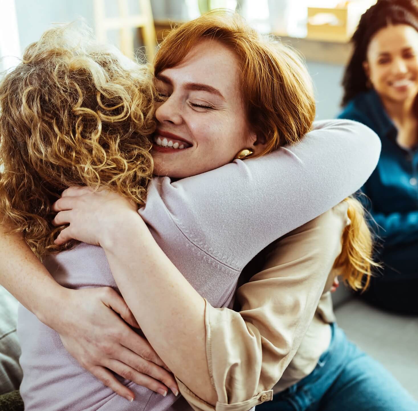 Women hugging so thankful